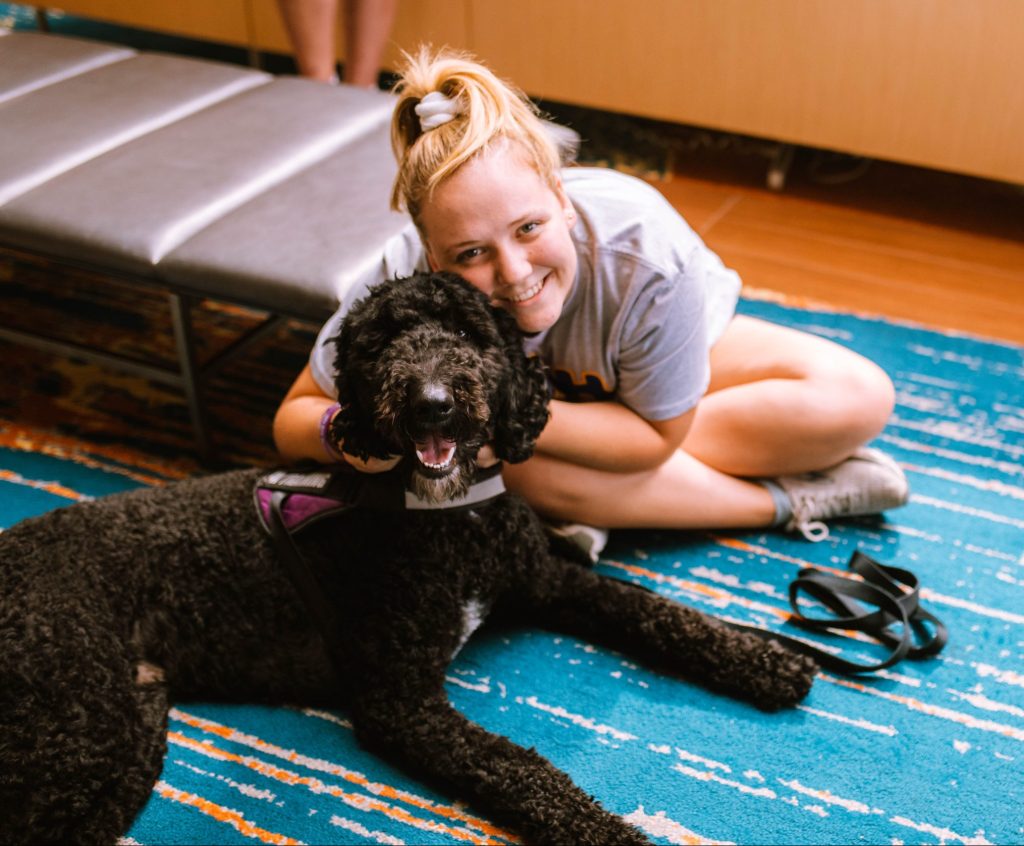 Megan with her Service Dog Axel